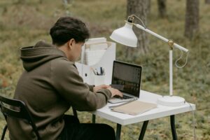 freelancer working on laptop at home